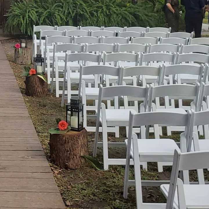 Padded white resin chair rental for wedding